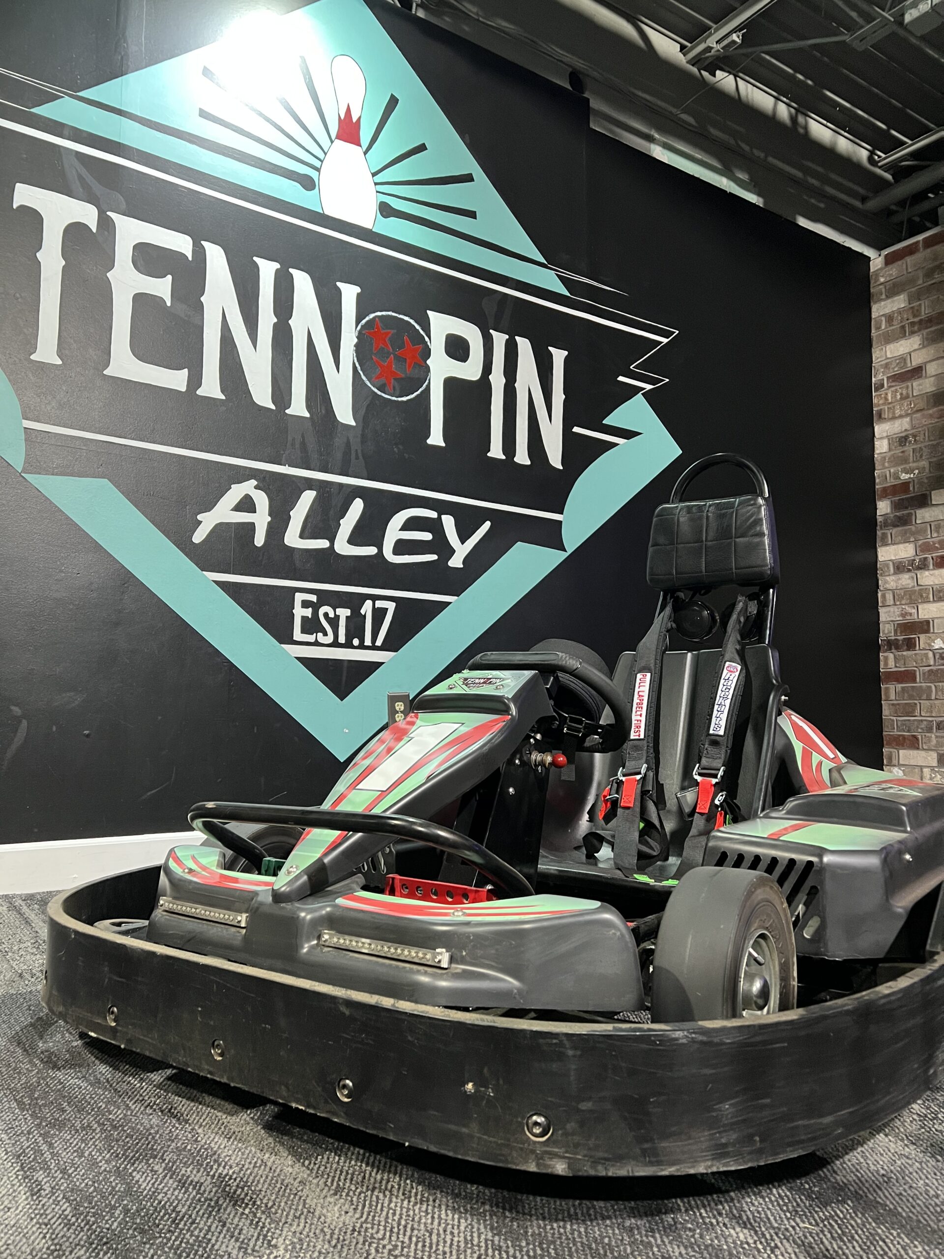 Tenn Pin Alley sign and go kart